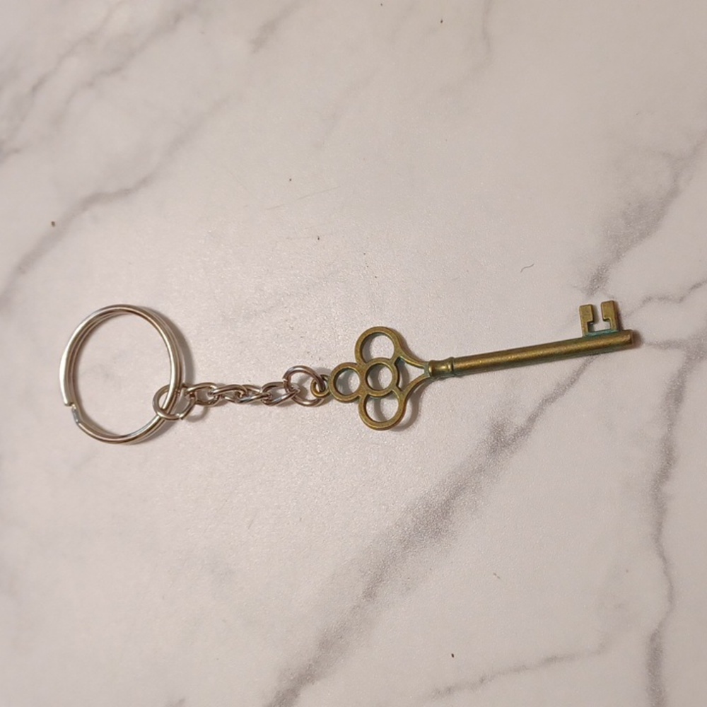4/$60 New Bronze Key Shaped Keychain